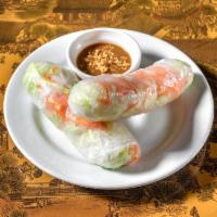 Vegetable Fresh Rolls (2) · Carrots, lettuce, and rice noodles wrapped in fresh rice paper. Served with peanut sauce.