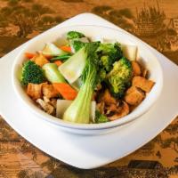 Vegetable Tofu Noodle Soup · Seasonal vegetables, fried tofu, and rice noodles in a savory sesame soy broth.