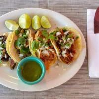 Taco with Corn Tortilla · Mushrooms and spinach, rajas de cactus or beans and Oaxaca cheese.