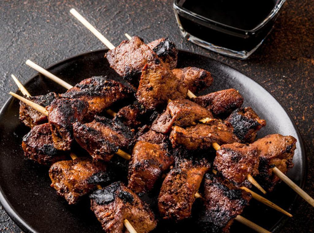 Filet Mignon Beef Skewers  · Marinated Filet Mignon grill over open fire, serve with a side of cucumber salad