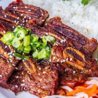 Grilled Beef Short Ribs with Rice · Broken jasmine rice with grilled marinated beef short ribs.
