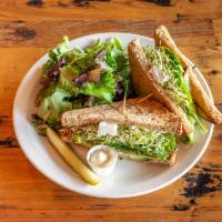 Veggie Sandwich · Roasted bell peppers, goat cheese, fresh spinach, sprouts, pesto sauce, cucumber and wheat b...
