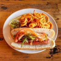 Mona's Hot Dog · Sauteed jalapenos and onions, melted cheddar cheese, tomatoes, side of relish and hot dog bu...