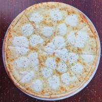White Pizza · Ricotta, provolone, mozzarella, and Parmesan cheese topped with sun-dried tomatoes and flavo...