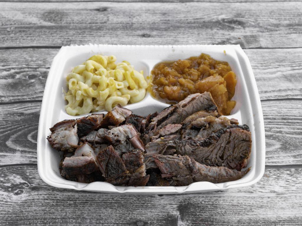 2 Meat Plate · Meat options between Chicken, Brisket, Pork Rib, & Homemade Sausage with 2 sides, sauce, and bread.