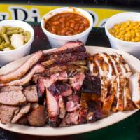 #1 Family Pack (1-1/2 lb Meat with 2 Large Sides) serves 2 - 3 ppl · 2 Meat option:  Brisket, Homemade Sausage, and Chicken