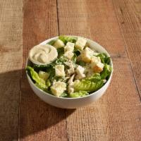 Chicken Caesar Salad · Romaine lettuce with herb-baked chicken breast tossed with Caesar dressing, Parmesan, and ho...