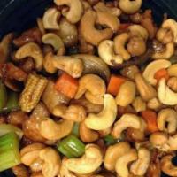 Chicken with Cashew Nuts · Diced chicken sauteed with crispy cashew nuts in a tasty brown sauce.