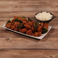 Orange Flavored Chicken · Crispy chunks of boneless chicken sauteed with hot peppers and orange peel in a delicious sp...