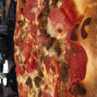 Meat Lover's Pizza · Fresh homemade pizza sauce, pepperoni, Canadian bacon, sausage, hamburger and mozzarella che...
