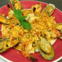 Seafood Special · Shrimp, clams, lobster and mussels in sherry wine sauce over linguini pasta.