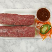 Crunchy Rolls · Grilled cured pork patties with a crunchy roll in the middle. Rolled in rice paper with verm...