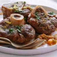 Veal Osso Bucco · Stewed in its own natural sauce tender and flavorful to the bone.