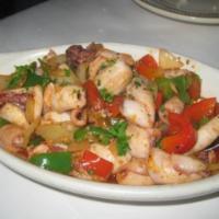 Calamari a la Sevillana · Sautteed squid with mixed vegetables.