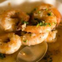 Gambas al Ajillo · Spain's most famous tapa. Sauteed shrimps in olive oil, garlic, and Spanish dry sherry.
