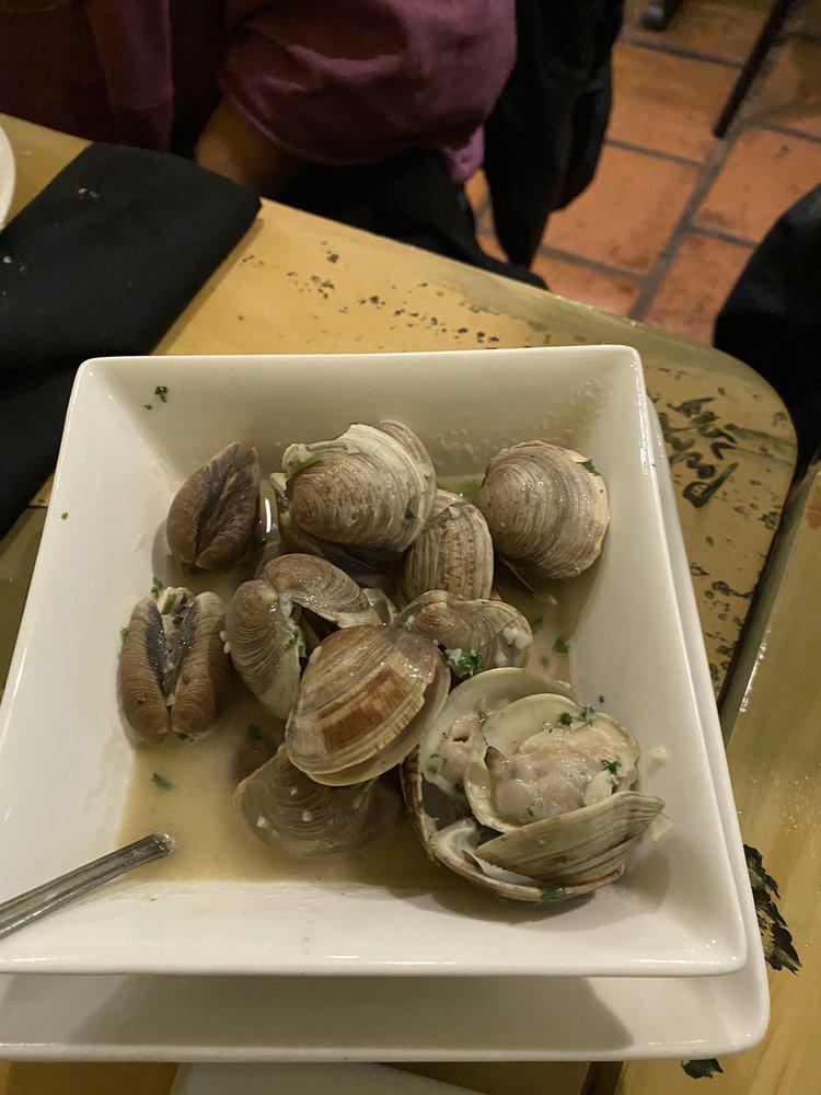 Almejas en Salsa Verde · Sauteed clams with olive oil, garlic, parsley, and Spanish dry sherry.
