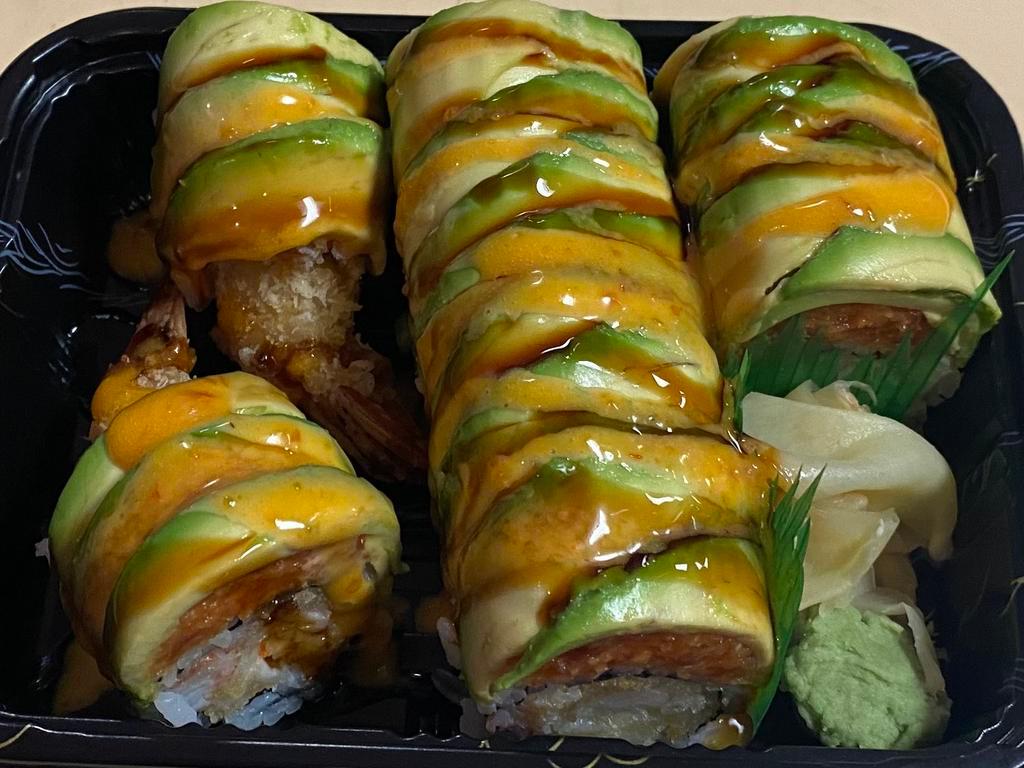 20. Kumo Roll · Raw. Shrimp, tempura, spicy crab stick inside, topped with avocado, spicy tuna, eel sauce and spicy mayo. 