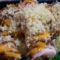 28. Snow Roll · 10 pieces. Shrimp tempura, spicy tuna, avocado in side rolled with soybean paper. Topped wit...