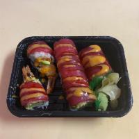 29. Red Dragon Roll · Raw. Shrimp tempura, avocado, cucumber inside, topped with fresh tuna, eel sauce and spicy m...