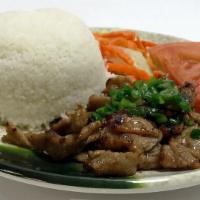 C4. Com Thit Nuong · Grilled charbroiled pork served with rice and fish sauce.
