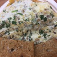 Healthy Omelette · Mushrooms, spinach and egg whites. Served with home fries and your choice of toast.