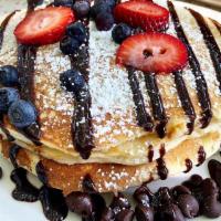 Chocolate Chip Pancakes · 4 Delicious Chocolate Chip Pancakes topped with Powdered Sugar, Maple Syrup & Milk Chocolate...