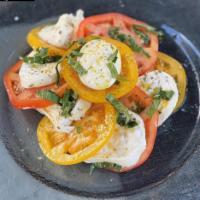 Insalata Caprese · Homemade fresh mozzarella, fresh tomato, basil, extra virgin olive oil