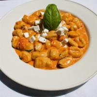 Gnocchi di Patate alla Sorrentina · Potato gnocchi in a light tomato sauce, with fresh mozzarella cheese, Vegetarian.