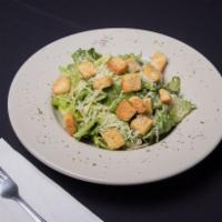 Caesar Traditional Salad · Romaine and iceberg lettuce tossed with seasoned croutons, Parmesan cheese, and Caesar dress...