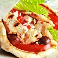 Chicken Gyro · Grilled Chicken and Salad in toasted pita topped with homemade Taziki sauce (White Sauce)