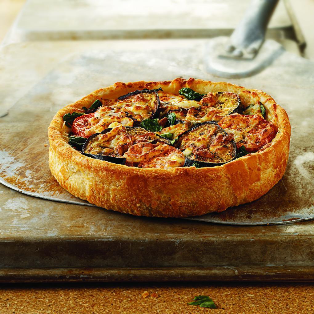 Veggie Deep Dish Pizza · Lots of cheese and the freshest mushrooms, onions, and green peppers. A vegetarian delight.