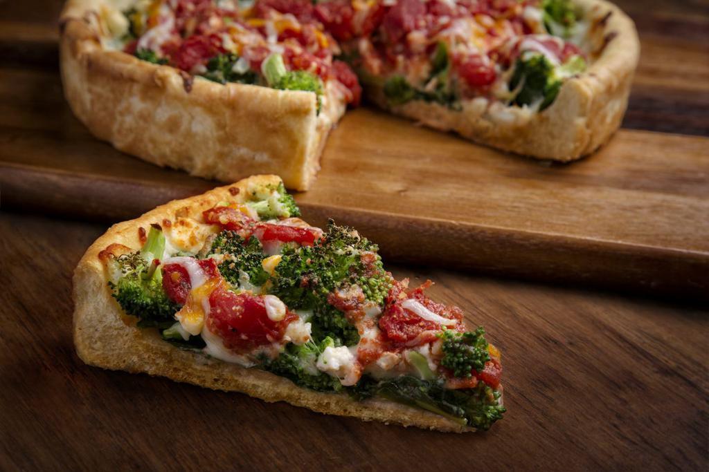 Spinoccoli Deep Dish Pizza · Spinach, fresh broccoli, a blend of cheeses, a little garlic, and chunky tomato.