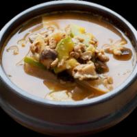 Cheongguk-Jang 청국장 清麴酱 · A thick stew made of beef, bean curd kimchi, and other ingredients in a broth seasoned with ...