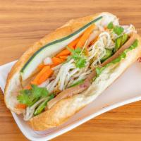 S11. The Sinner Sandwich · Braised pork belly, black pepper, lettuce, cucumber, cilantro, pickled carrots and soy sprou...