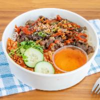 R4. Kim Chee Beef Short Rib Rice Dish · Sesame seeds, cucumbers, oiled scallions with chili lime fish vinaigrette. Foodie Favorite.