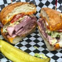 Ham and Cheese Sandwich · Ham, cheddar, lettuce, tomato,  and signature sandwich spread.