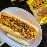 Philly Cheesesteak  · Shaved ribeye with grilled green peppers, grilled onions, cheddar cheese sauce, served on a ...