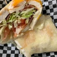 Chicken Bacon Ranch Wrap · Our fresh roasted chicken with cheddar cheese, applewood smoked bacon, fresh lettuce and tom...