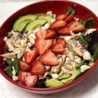 Strawberry Fields Salad · Chicken, strawberries, spinach, onions, feta, almonds, and avocado.
