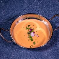 Lobster Bisque · Chunks of lobster in light tomato cream sauce. 