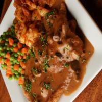 Jäger Schnitzel · Our most popular dish. Seasoned cutlets, lightly breaded then crisped to a golden brown and ...