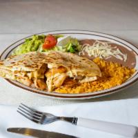 22. Shrimp Quesadilla · A flour tortilla grilled with cheese, beans, and shrimp.