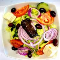 Greek Salad · Fresh lettuce, tomato, onion, feta, kalamata, olives, and vinegar dressing.