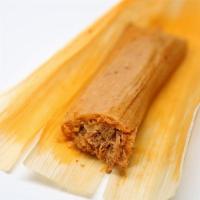 Tamale · Dough wrapped around a filling and steamed in a corn husk or banana leaf.