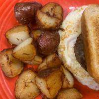 Breakfast Sandwich  · 2 fried eggs, bacon or sausage, cheddar cheese, Texas toast.