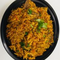Lamb Biryani · It’s Indian basmati rice, cooked with onion garlic ginger, homemade spices, bone less lamb,