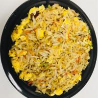 Egg Biryani · It Indian basmati Rice, and sacrambel eggs, biryani spices