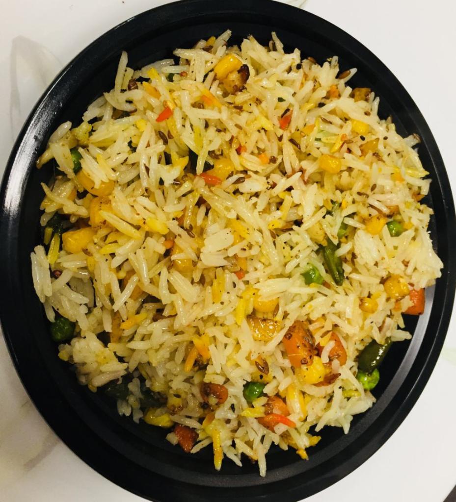 Veg Biryani · Veg biryani, cauliflower, carrot, peas, onion garlic ginger, basmati rice and Biryani spices