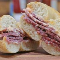 Reuben Bagelwich · Bullfrog’s Corned Beef with house made Sauerkraut, Swiss cheese and 1000 Island dressing. 