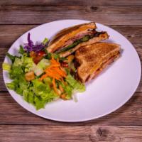 Southwest Turkey Club Sandwich · Turkey, wheat bread, bacon, Jack cheese, lettuce, tomato, and chipotle mayo.